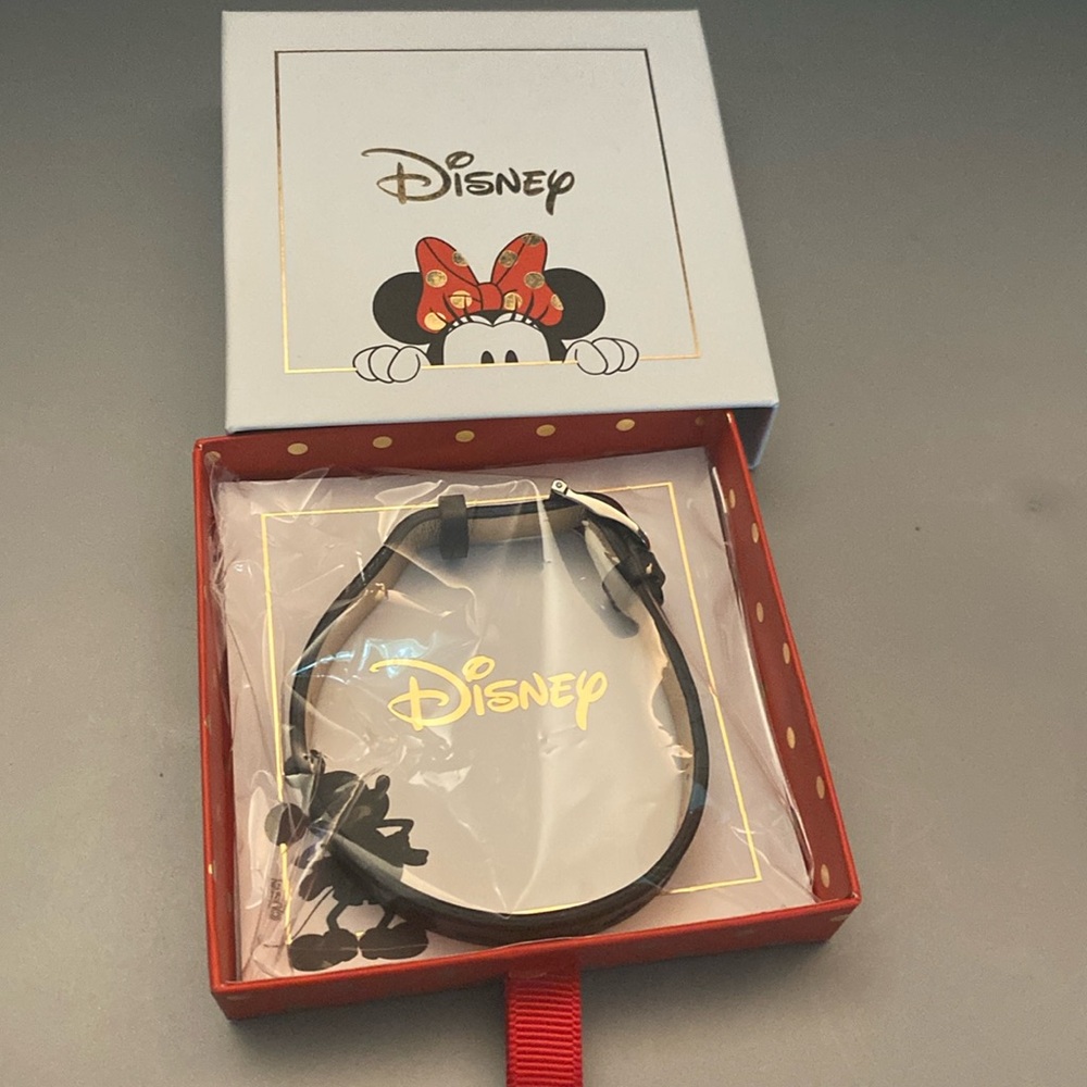 Mickey Embossed Single Leather Band which was reversible with black embossed